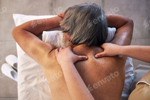 Preview: Health, massage and back of man in spa for wellness, holistic treatment and hospitality. Peace, cos
