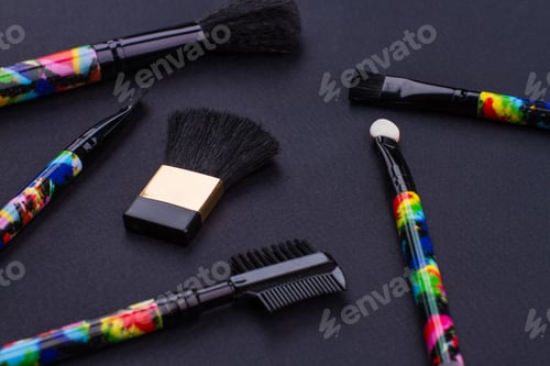 Preview: Different cosmetic brushes isolated on black background.