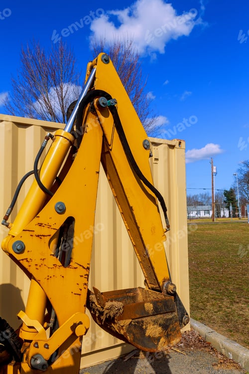Preview: Excavators machine in construction site on blue sky background