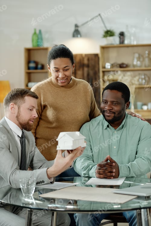 Preview: Man showing house mockup to clients
