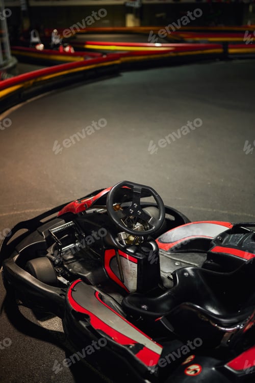 Preview: go cart kart for racing, red racing car inside of indoor kart circuit, motor race vehicle