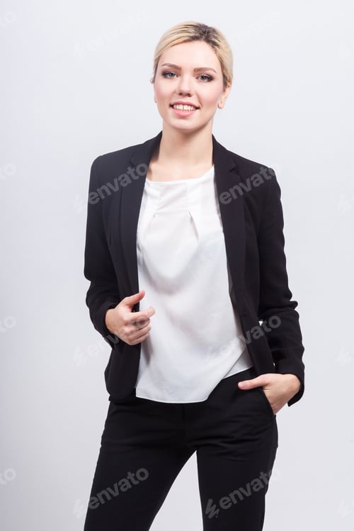 Attractive business lady in strong office jacket