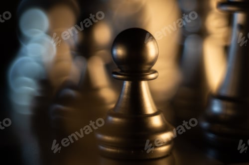 Preview: Closeup shot of a pawn chess piece on a chessboard with bokeh lights