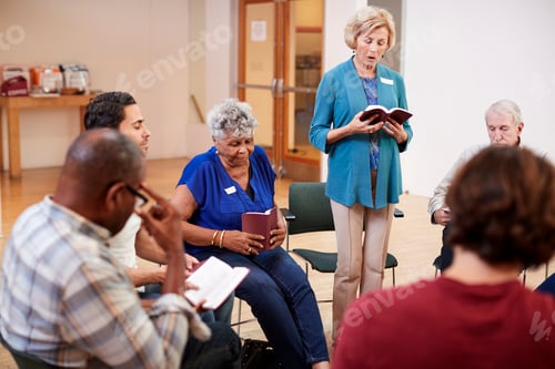 Preview: People Attending Bible Study Or Book Group Meeting In Community Center