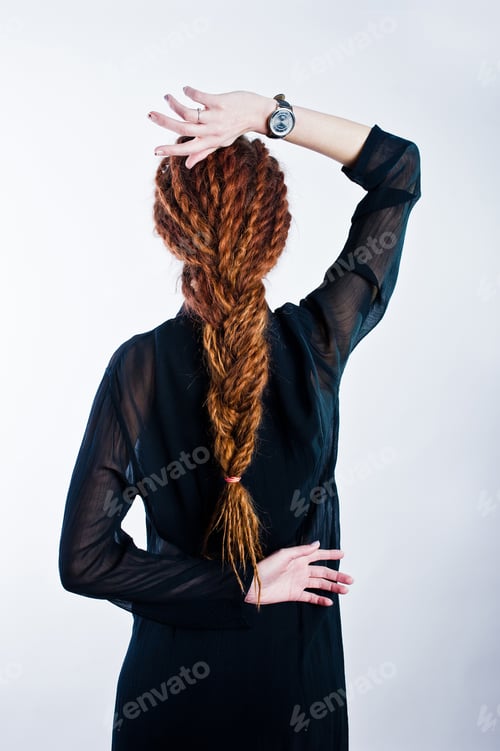 Preview: Studio shoot of back girl with dreads on white background.