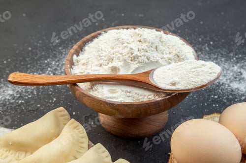 Preview: front close view raw little hotcakes with flour on dark background pie dough cake bake cooking dust
