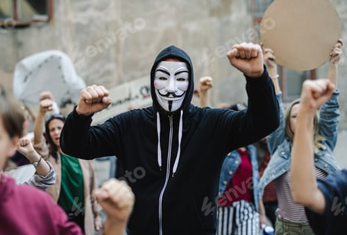 Preview: Group of people activists with face mask protesting on streets, strike and demonstration concept