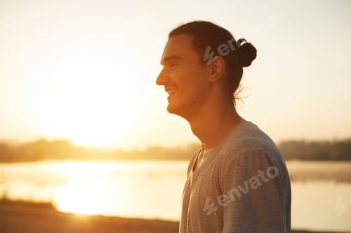 Preview: Handsome man resting after workout in the park