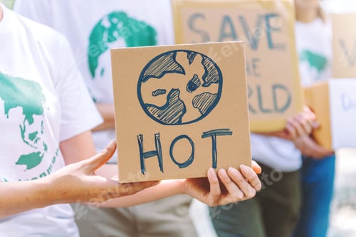Preview: Group of diverse people volunteer teamwork holding campaign signs in charity event