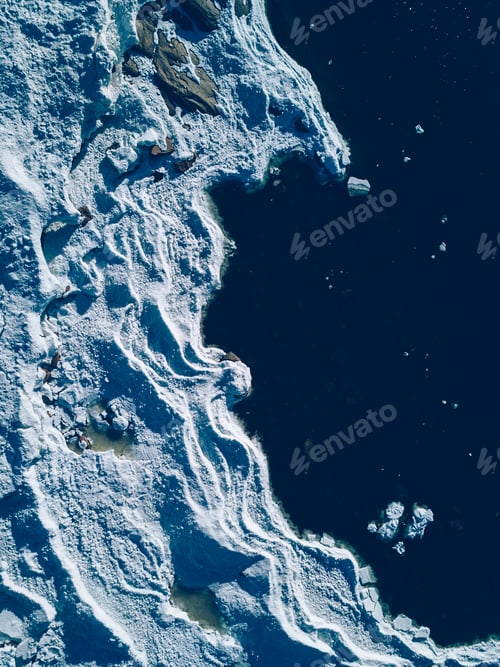 Preview: Aerial view of lake or sea ice formations in Finland. Cracked Ice from drone view.