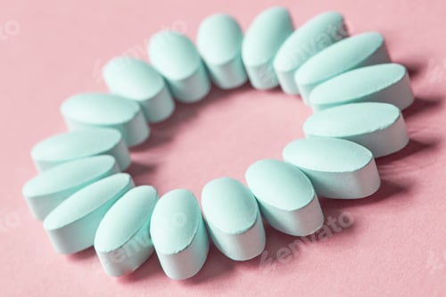 Preview: blue pills on pink background