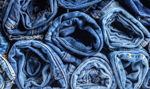 Rolled Up Blue Denim Jeans Close Up