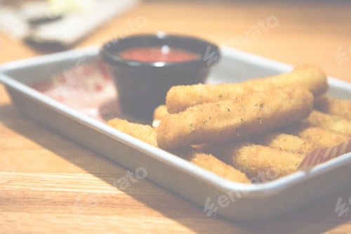 Golden Fried Mozzarella Sticks with Dipping Sauce
