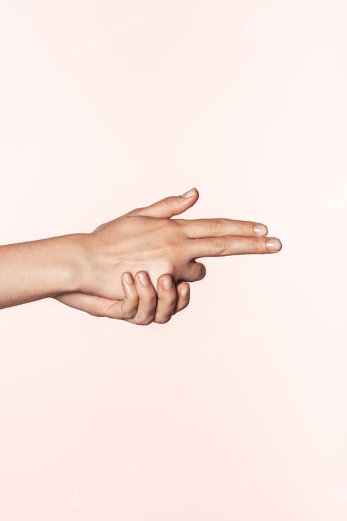 Preview: cropped image of female hands shaped in form of gun isolated on pink background