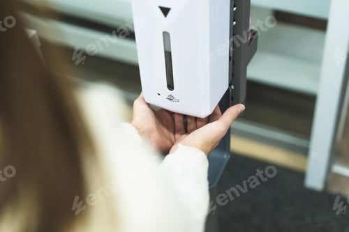 Preview: Cleaning, washing hands using automatic sanitizer dispenser concept.