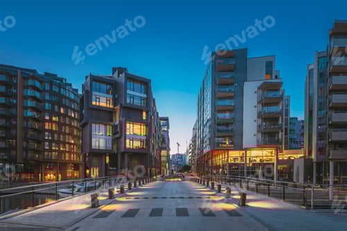 Preview: Oslo, Norway. Night View Of Residential Multi-storey Houses In Aker Brygge District. Summer Evening