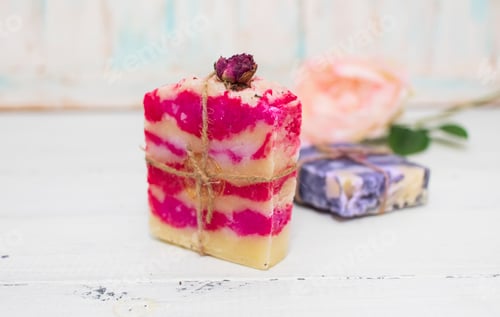 Preview: Handmade natural soap with rose and lavender on wooden background