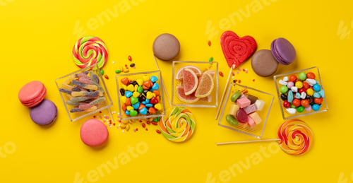 Preview: Various colorful candies, lollipops, and macaroons