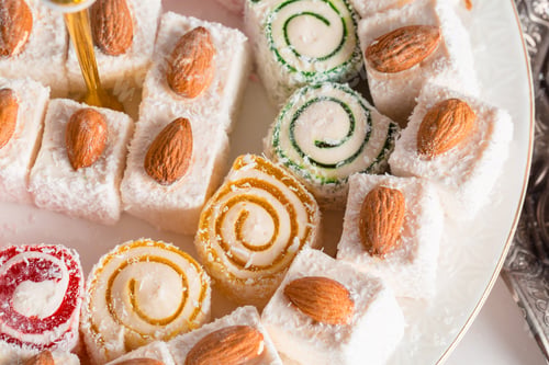 Preview: Turkish delight on a wooden table. creative photo