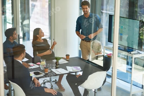 Preview: Shot of a corporate businessperson giving a presentation in the boardroom