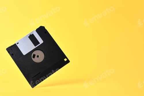 Preview: Floppy disk on yellow background