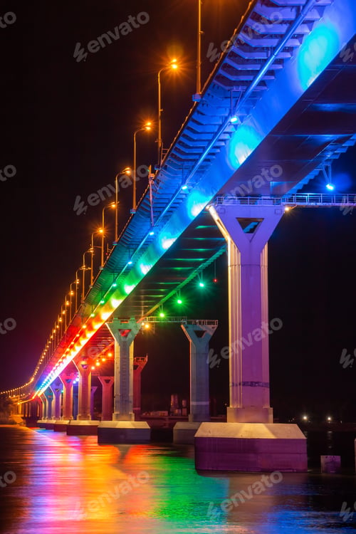 Preview: Multi-colored bridge at night