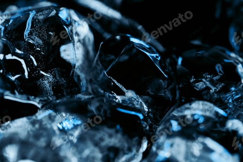 Preview: close up view of frozen ice cubes with blue lighting isolated on black