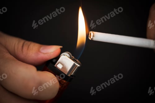 Preview: Macro shot of hand holding lighter