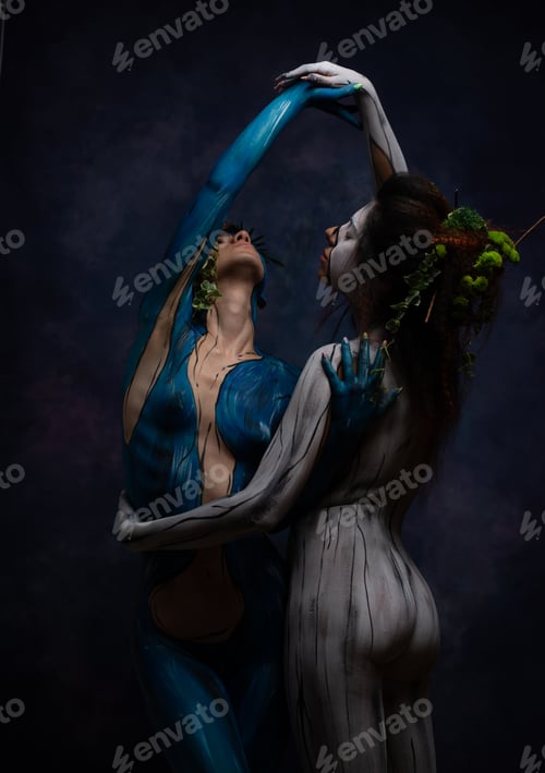 Preview: Studio portrait of woman painted on body paint