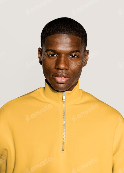 Preview: Black man in yellow zip up sweater portrait