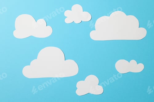 Preview: white paper clouds on blue background