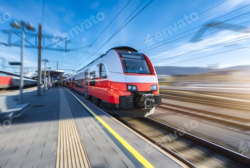 Preview: High-speed red passenger train moving at railway station platform