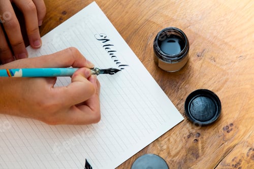 Preview: Woman writing with calligraphy pen