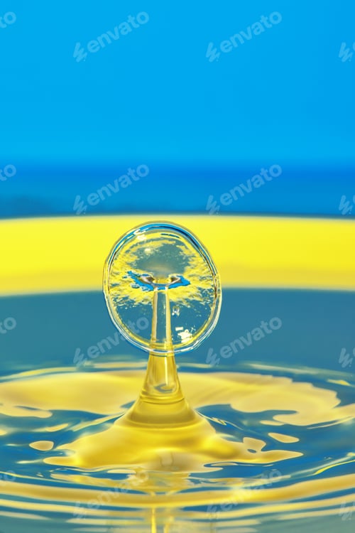 Preview: Abstract background of splash of color water, collision of colored drops, the concept