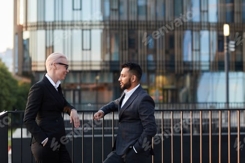 Preview: Business people at balcony