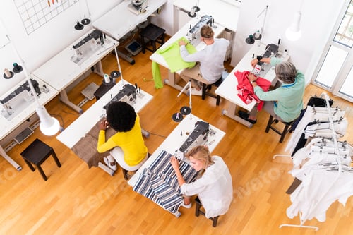Preview: Team of fashion designers at work