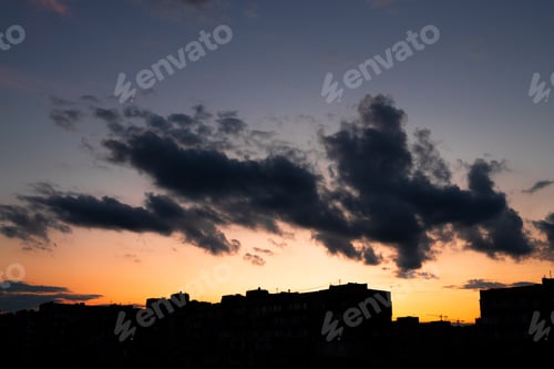 Preview: Cloudscape, Colored Clouds at Sunset over the city in the evening.