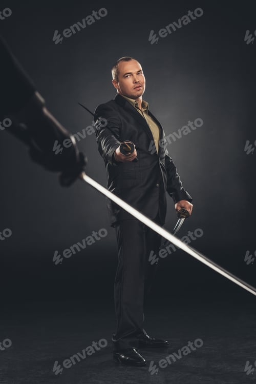 Preview: modern samurai in suit ready to fight on black