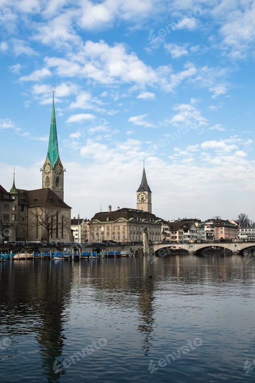 Preview: View of historic city of Zurich. Fraumunster Church and river Limmat at Lake Zurich. Switzerland.