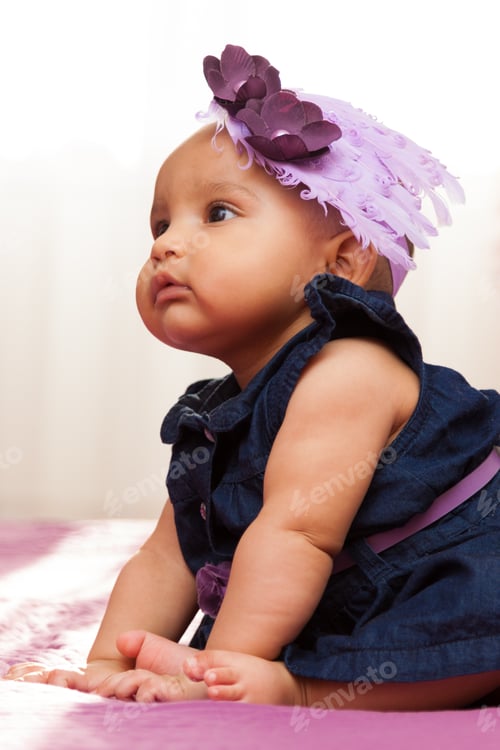 Preview: Infant in Blue Dress with Purple Headband