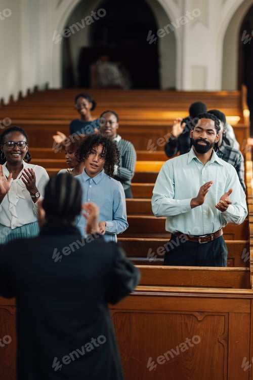 Preview: Congregation clapping along to gospel music in church