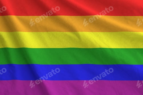 Preview: LGBT community flag depicted on folded wavy fabric of old cloth