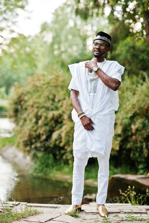 Preview: Rich black man at white national dress