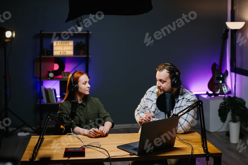 Preview: An online blogger is filming a podcast episode with a guest in the studio.