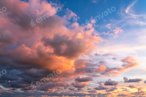Preview: Small clouds in dramatic real sky at sunset texture background overlay.