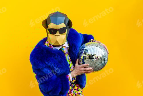 Preview: Man with funny low poly mask on colored background