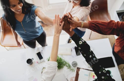 Preview: Happy fashion designers doing a high five