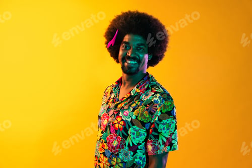 Preview: African man portrait in studio on colorful background