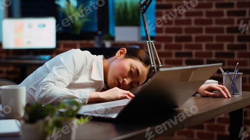 Preview: Tired employee asleep on computer desk chair suddenly waking up