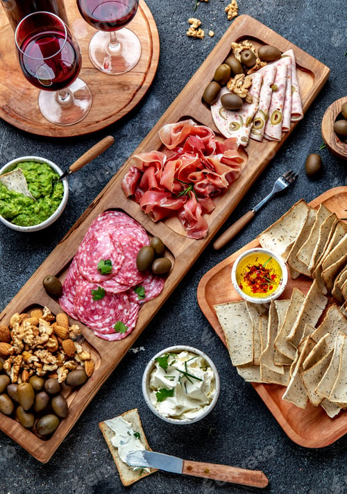 Preview: Antipasto Platter. Ham serrano, salami olive jamon dip sauces and red wine